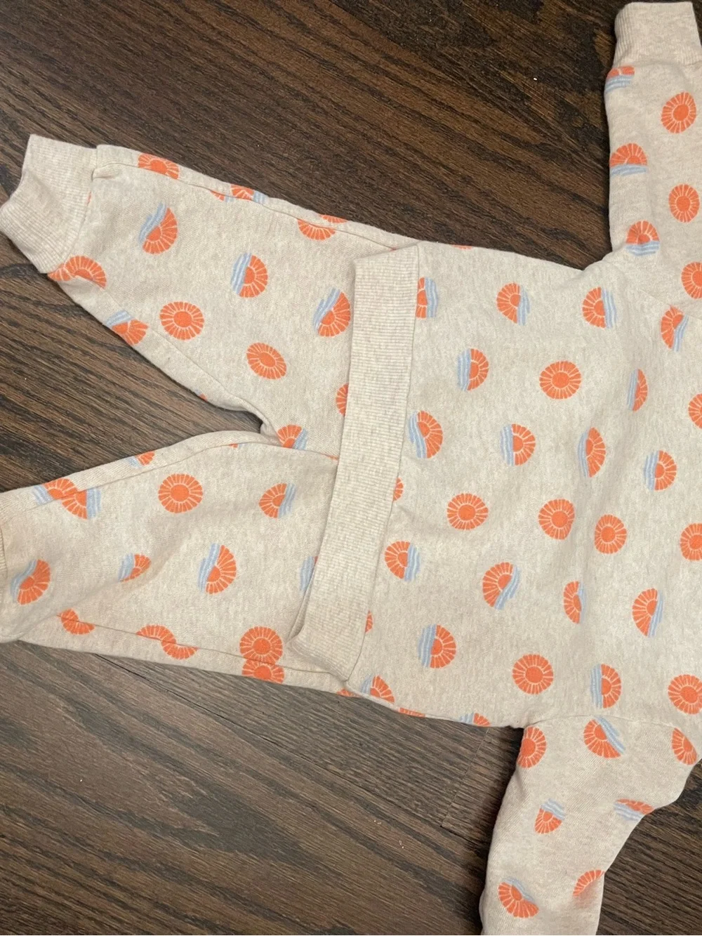 Neutral Baby Sweatshirt & Pants Set with Orange Sun Motif